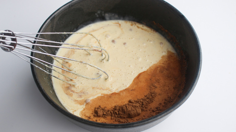 milk and cinnamon in pan