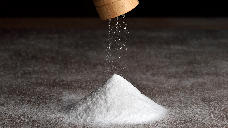 Salt falling from grinder