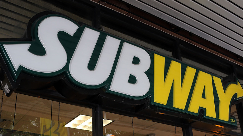 Subway sign above window