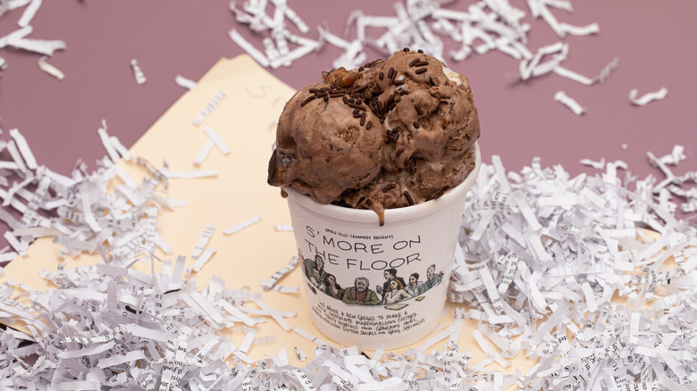 New chocolate ice cream next to scrap paper