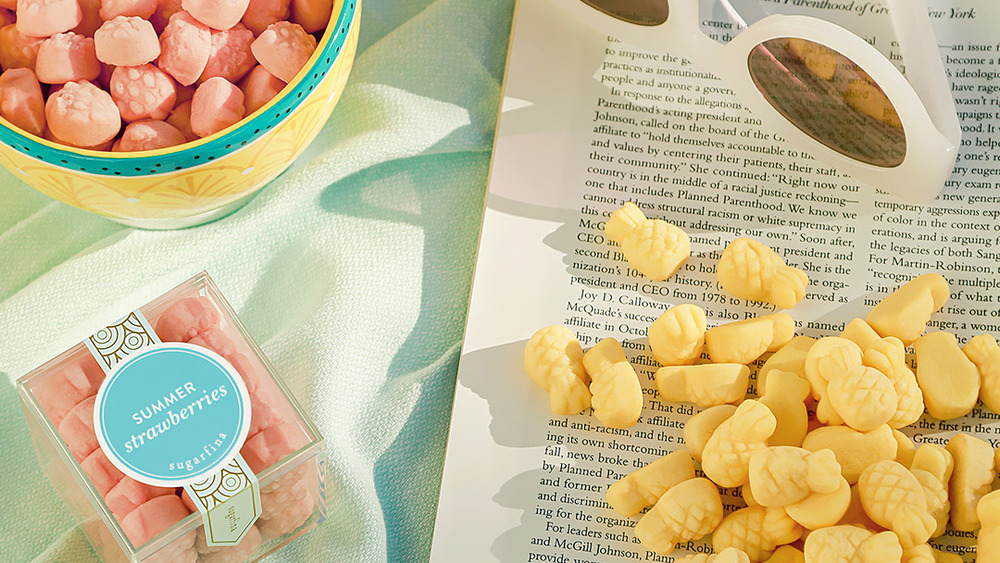 Sugarfina candies laid out on a book