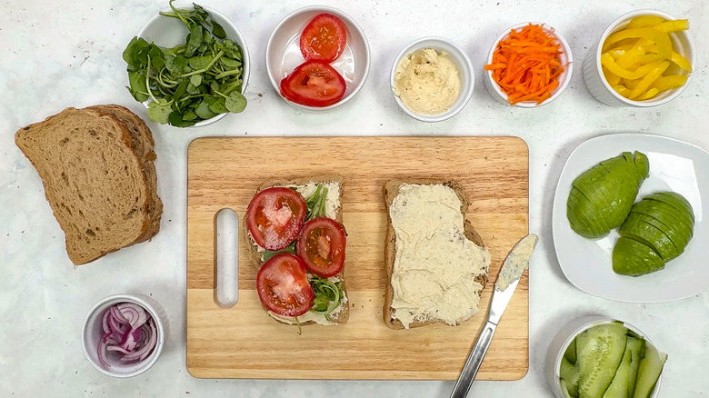 bread with hummus and tomatoes