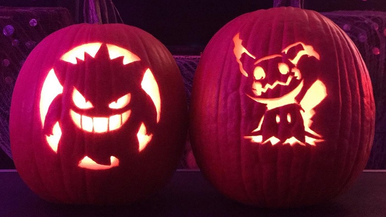 Two pumpkins with Pokemon carved on them