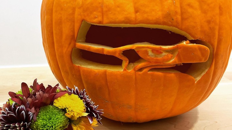 A pumpkin with the Eagles logo carved in it