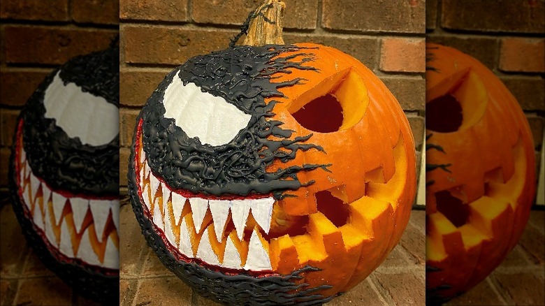 A carved and painted pumpkin themed after Venom