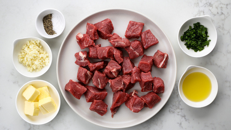 garlic butter steak bites ingredients on table