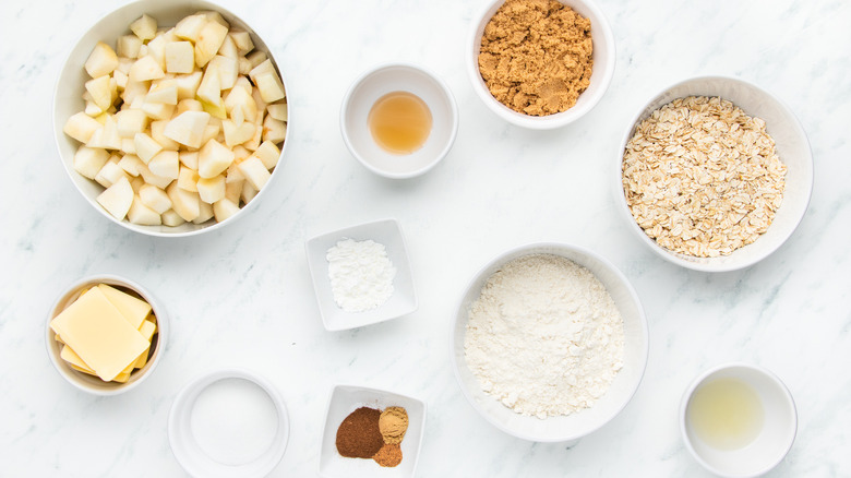 Pear crisp ingredients in bowls