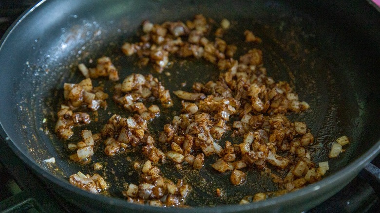 onion cooking in pan