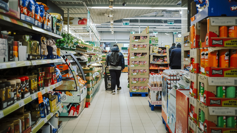 Supermarket aisle with packaged products