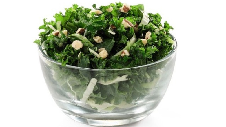 kale salad in glass bowl