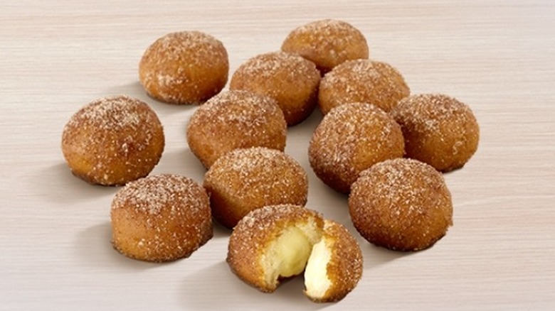 cinnabon delights grouped on table