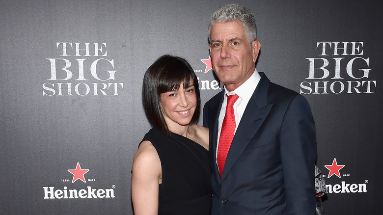 Anthony Bourdain with former wife Ottavia Busia beside him