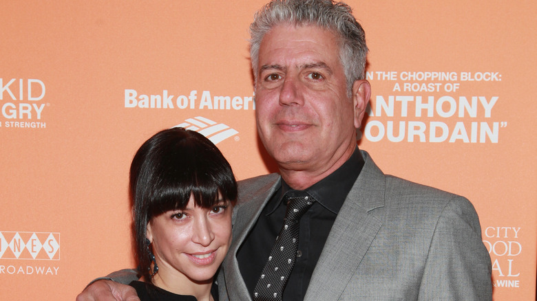 Anthony Bourdain with former wife Ottavia Busia beside him