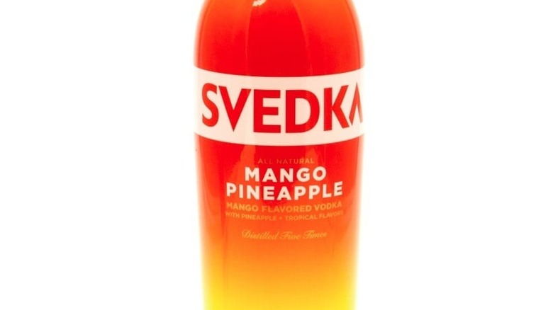 Svedka mango pineapple on white background