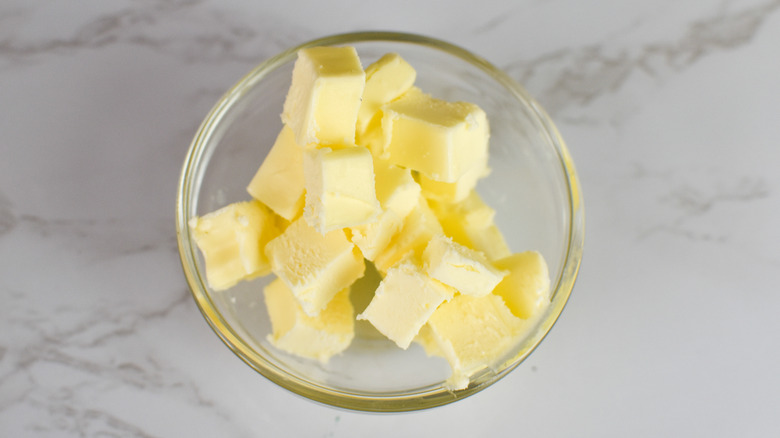 cubed butter in a dish 