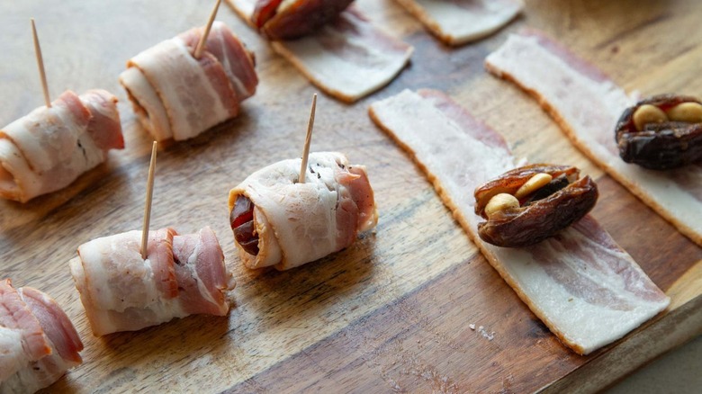 dates wrapped in raw bacon