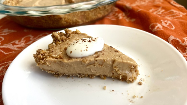 slice of peanut butter pie with whipped cream