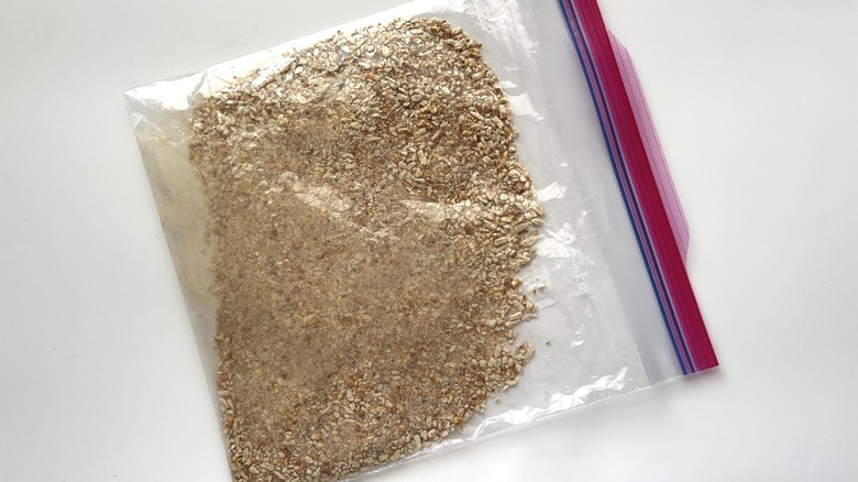 crushed pretzel crumbs in a ziploc bag