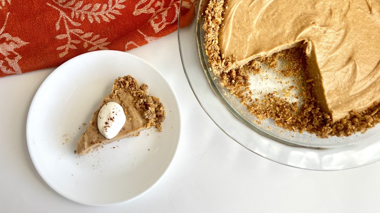 slice of peanut butter pie with whipped cream