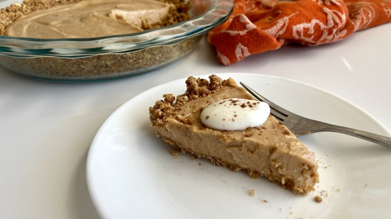 slice of peanut butter pie with whipped cream