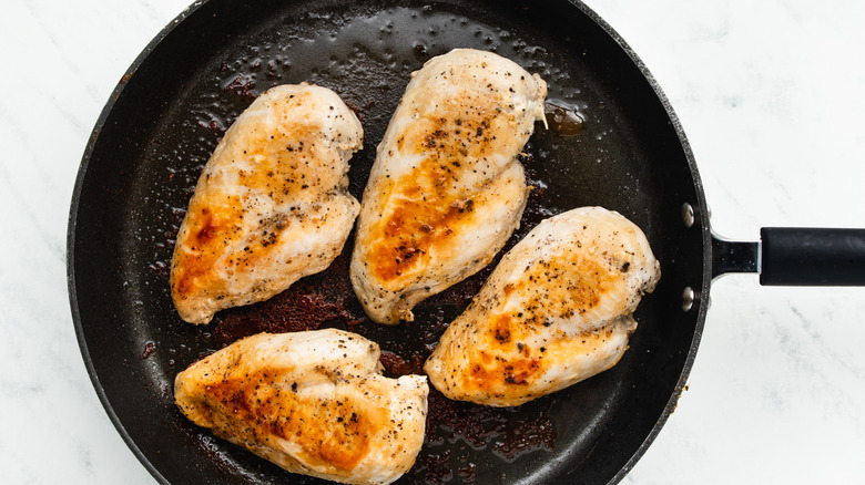 cooked chicken in skillet