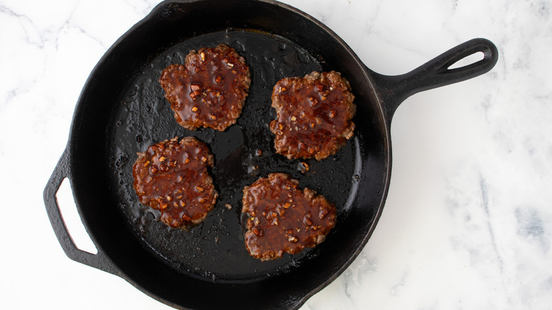 cooked glazed patties in skillet