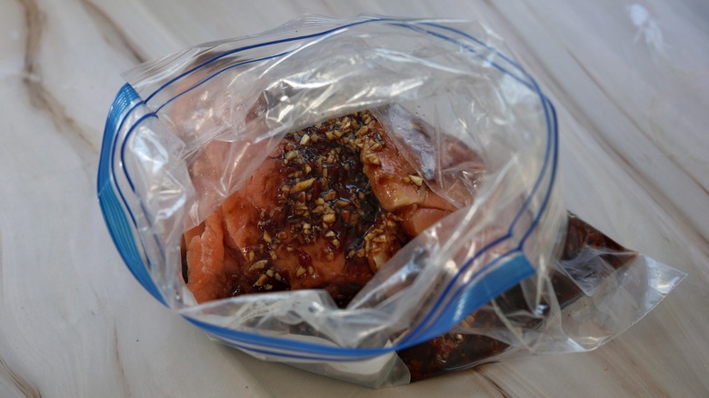 zip-top bag of salmon and marinade