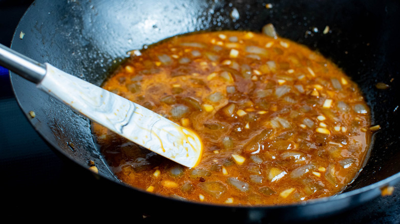 bourbon sauce in a wok