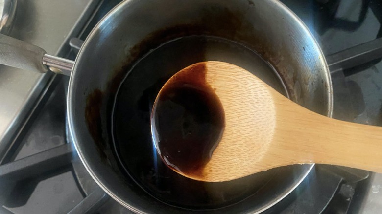 wooden spoon in glaze saucepan