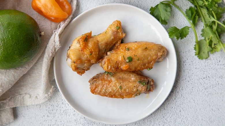 glazed chicken wings on a plate