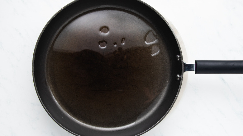 Oil heating in frying pan