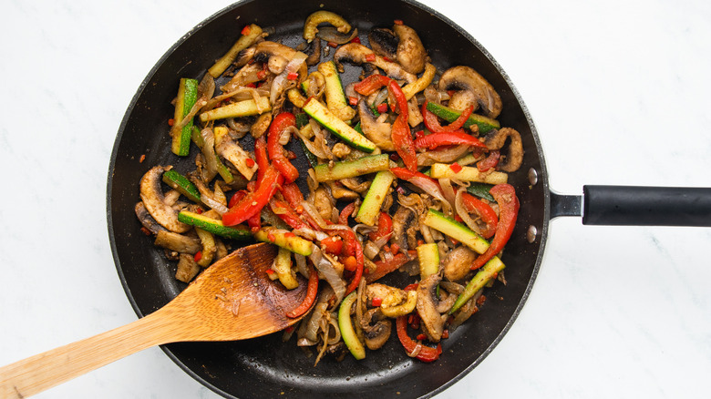 Vegetables stir-fry in pan