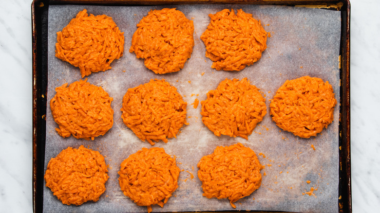 sweet potato fritters on baking sheet 