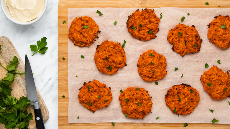 sweet potato fritters on baking sheet 