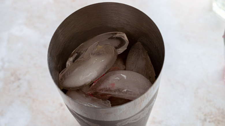 drink with ice in metal cup