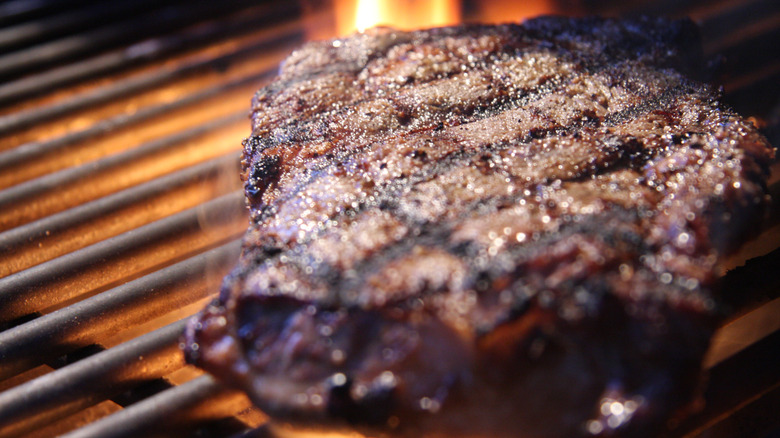 ribeye steak on grill