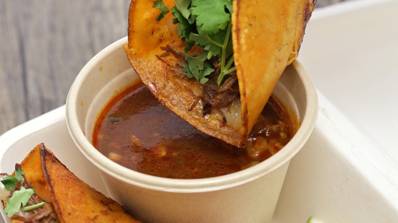 birria taco with dipping sauce