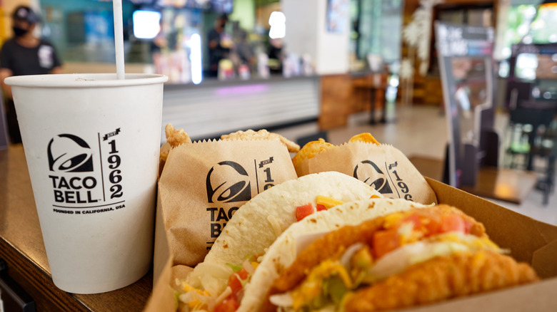 Taco Bell meal with tacos and a drink