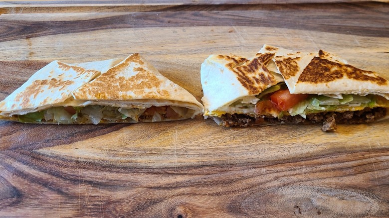 Crunchwrap supreme halves on board