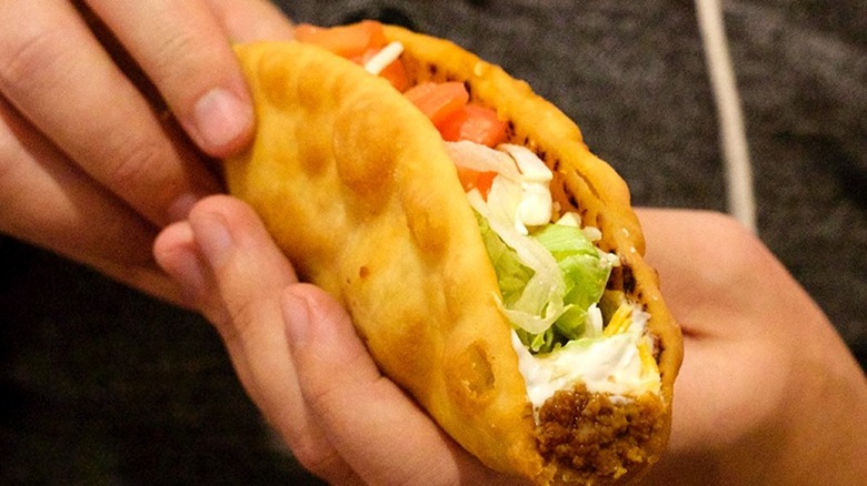 Person holding Chalupa Supreme