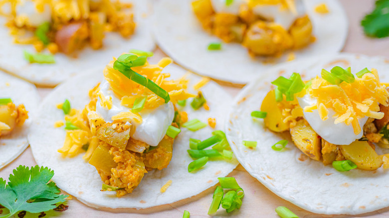 potato egg cheese breakfast tacos