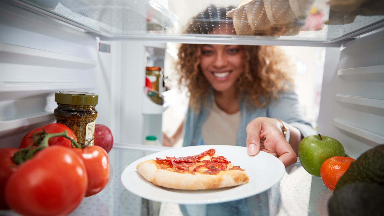 Here's How Long You Can Stash Leftover Pizza In The Freezer