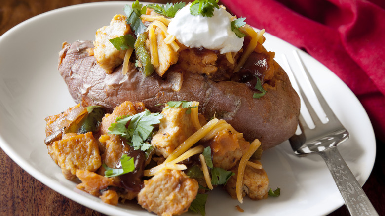 baked potato with barbecued chicken