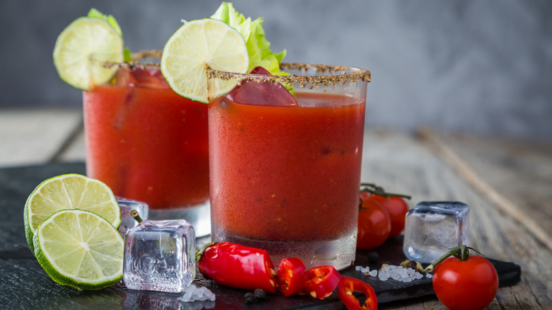 Bloody Mary cocktails with celery garnish