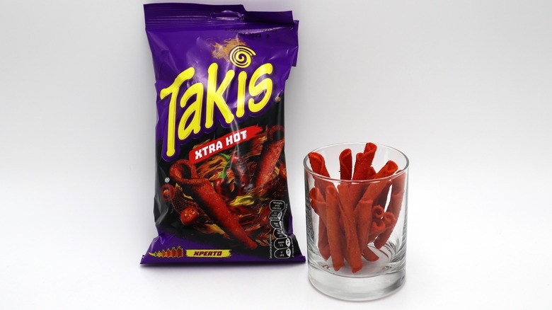 Takis bag and chips in glass