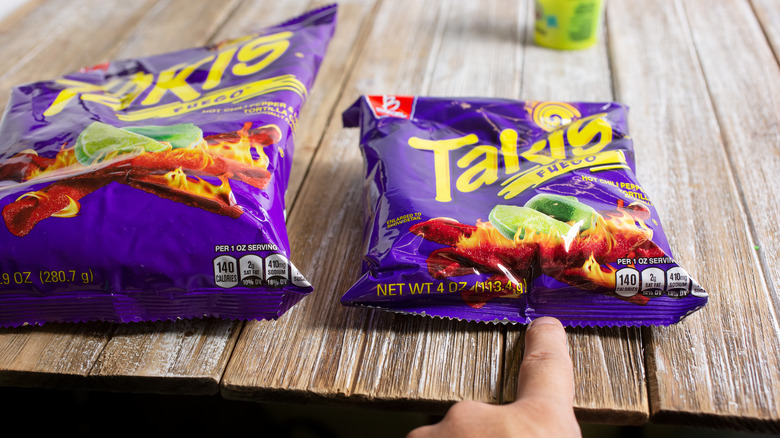 fuego takis bags on table