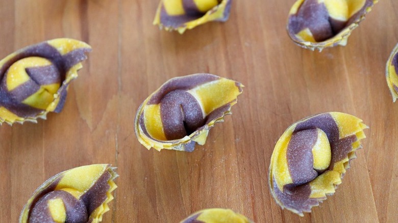 purple yellow tortelli capalletti pasta