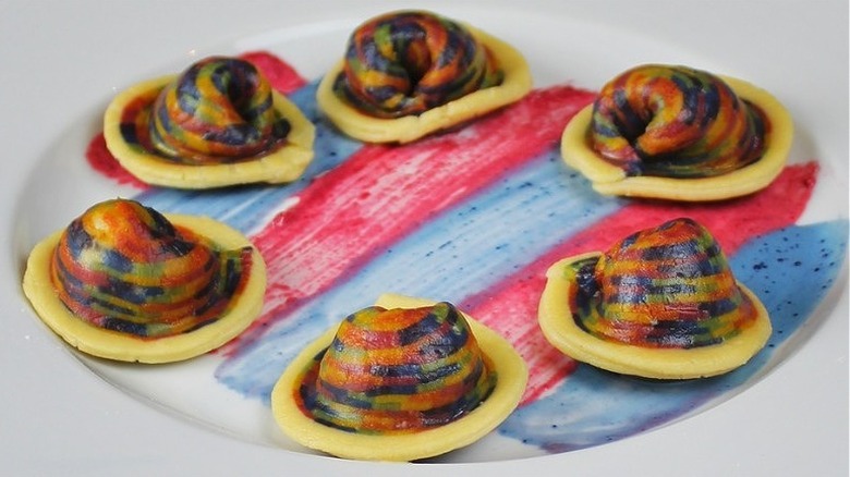 rainbow tortellini with blue and pink sauce