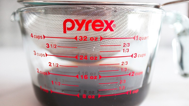 mesh strainer in measuring cup