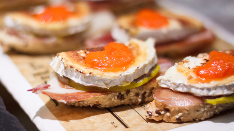 Goat cheese and jamon serrano on bread, tapas-style